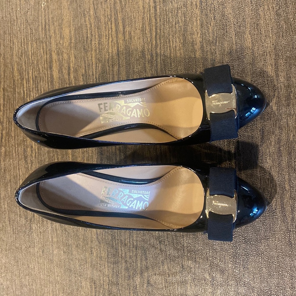 Salvatore Ferragamo black patent leather with classic ribbon bow!